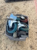 2438 - TUBE OF CASTERS ASSORTED SIZES