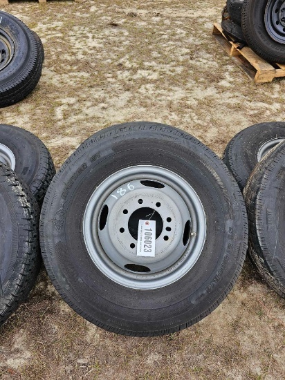 186 - 2 - 235/80 R16 TIRES ON 8 LUG RIMS