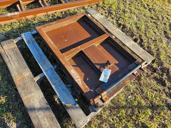 857 - 1/2 OF DUMP TRAILER TAILGATE