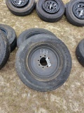 189 - 2 - 215/75 R17.5 TIRES ON 8 LUG RIMS