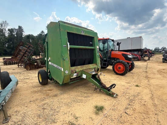 321 - John Deere 566 Baler