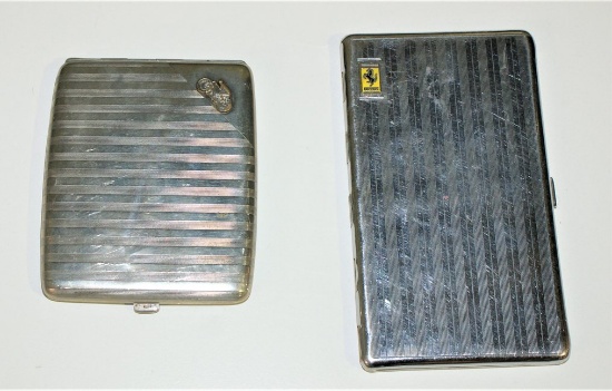 Two cigarette cases.