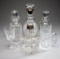 Glassware presented to Godfrey Evans, three decanters & stoppers, notably a