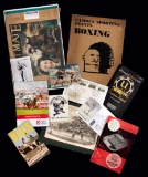 A large and varied collection of sports memorabilia mostly from the modern