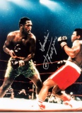 A Joe Frazier signed colour photograph, the 16 by 12in, image portraying Fr
