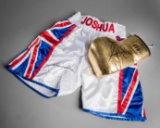 Anthony Joshua signed boxing glove and trunks, a gold left-hand V.I.P glove