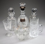 Glassware presented to Godfrey Evans, three decanters & stoppers, notably a