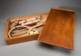 A Table Tennis set circa 1910, in wooden box with a pair of strung racquets