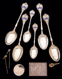 A set of six silver & enamel tennis spoons, four larger than is usual, for