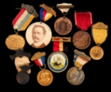 A collection of nine badges for the 1904 Louisiana Purchase Exposition, inf