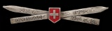 St Moritz 1928 Winter Olympic Games Swiss ski team badge, by Huguenin, desi
