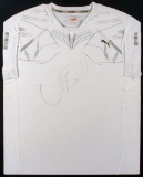 Usain Bolt signed Puma running vest, signed in marker pen, framed & glazed,