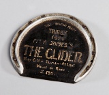 A racing plate worn by ''The Gilder'' when winning the Falcon Plate at Thir