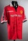 A multi-signed Manchester United 1999 Treble Winners jersey, 18 signatures