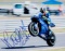 Valentino Rossi signed photograph, 8 by 10in., signed in blue marker pen