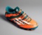 Lionel Messi signed football boot, a right-foot teal green, solar orange an