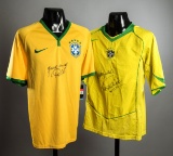 A duo of Brazil 5-star replica jerseys bearing the signatures of the 1970 W