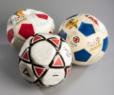 A trio of autographed footballs from the 1986 World Cup including the winne