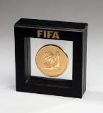 FIFA 2010 World Cup draw medal presented to PelŽ, the design featuring the