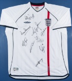 An England replica shirt signed by 10 capped internationals who have played