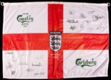 Signed Carlsberg sponsor's England football flag, 20 signatures in black ma