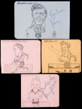 A collection of album pages with signed artist drawn caricatures of footbal