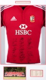 A framed British & Irish Lions shirt signed by the 2009 touring team to Sou