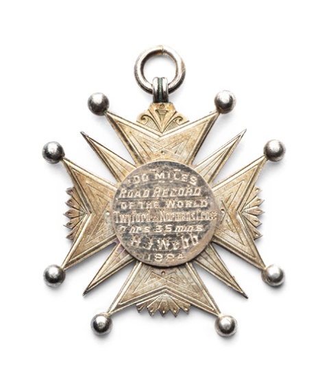 Gold-mounted silver medal for a 100 mile world road cycling record set in 1884 by Henry John Webb