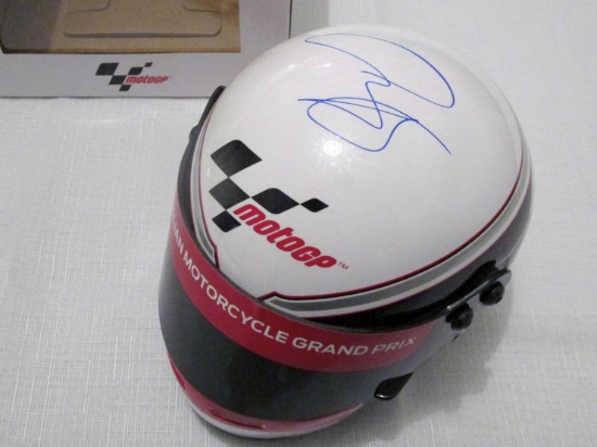 A group of six signed MotoGP caps & a ½ Scale Moto GP Helmet (Australian Moto GP)