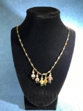 14K gold chain with multicolored stones and 5 kid charms