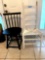 White ladderback and black spindle back chairs