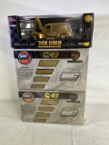 (1) Racing Champions stock rods 24K gold die-cast car, (2) Revell C43 1997 Dodge Ram super trucks