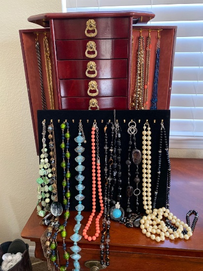9-drawer jewelry chest and necklaces