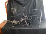 Metal boat and sphere decor items
