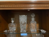 (2) decanters, (2) stoppers and vase with iris motif