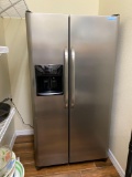 Frigidaire side by side refrigerator with ice /water dispenser