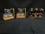 Camera bookends and monkey figure