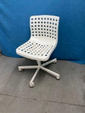 White plastic rolling chair