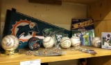 Bin of Autographed Sports Memorabilia and other sports Collectibles