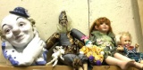 Lot of Clowns and Porcelain Doll