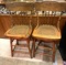 Pair of Wood Carved Swivel Bar Chairs