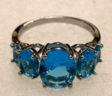 Oval Cut 5 Stone Light Blue Topaz Ring Size 8