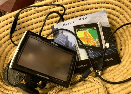Magellan GPS with Charger and Book