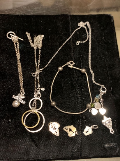 2 Sterling Silver Necklaces, 2 Sterling Silver Bracelets and 4 Sterling Silver Charms