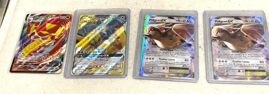Lot of 4 Pokemon Cards