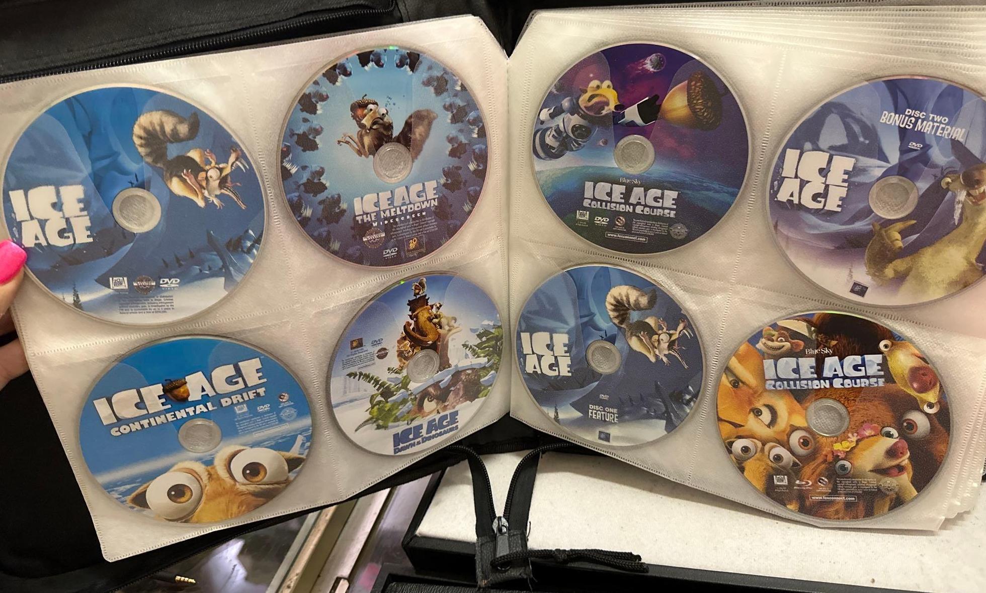 Over 110 DVDs + Blu Rays in a Binder - Disney, | Proxibid