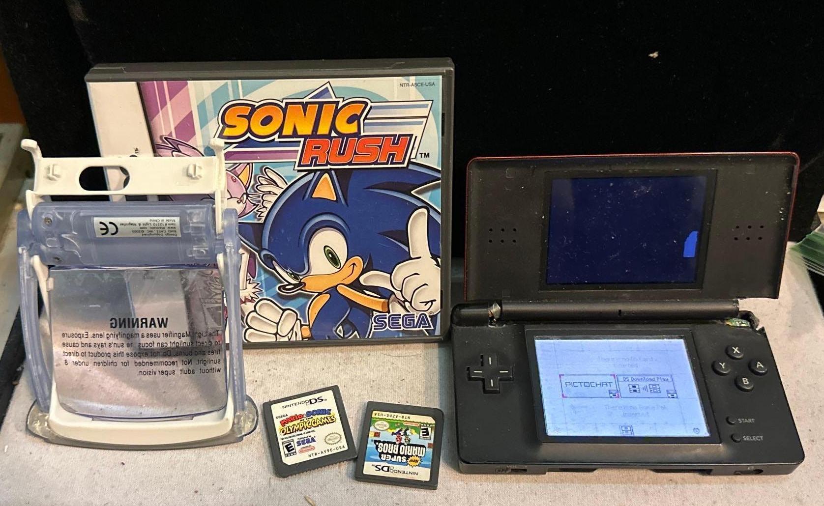 Nintendo DS lite w/3 Games and Mad Catz | Proxibid