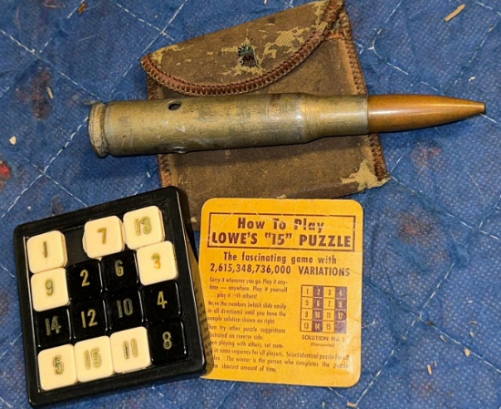 Vintage Lowe's Puzzle game and Deactivated 50 Cal Round