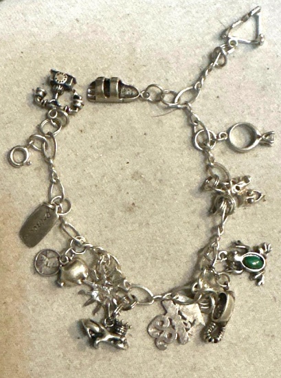 Sterling Silver Charm Bracelet Loaded with Silver Charms