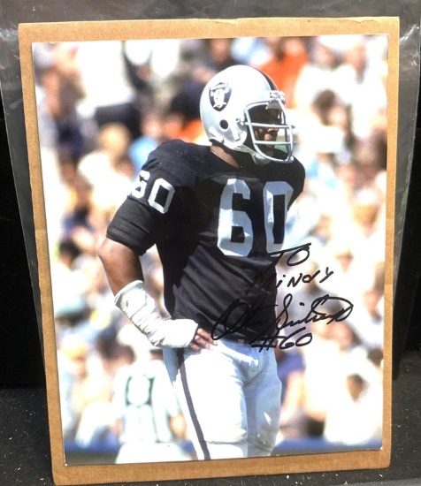 Autographed Raiders Football #60 Photo